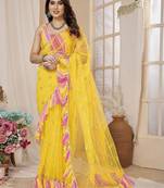 Yellow embellished mirror work net ruffle saree with blouse piece