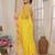 Yellow embellished mirror work net ruffle saree with blouse piece