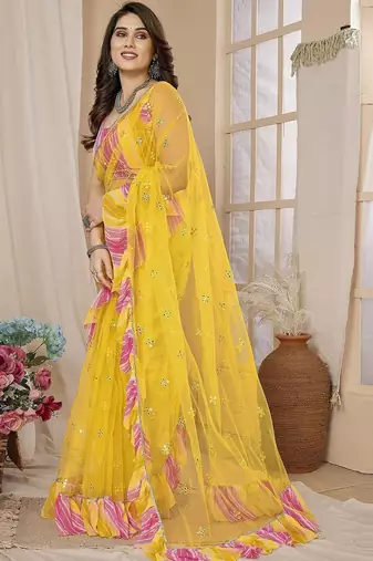 Yellow embellished mirror work net ruffle saree with blouse piece