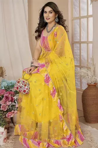 Yellow embellished mirror work net ruffle saree with blouse piece