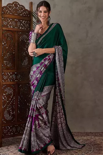 Green ethnic motifs silk blend saree