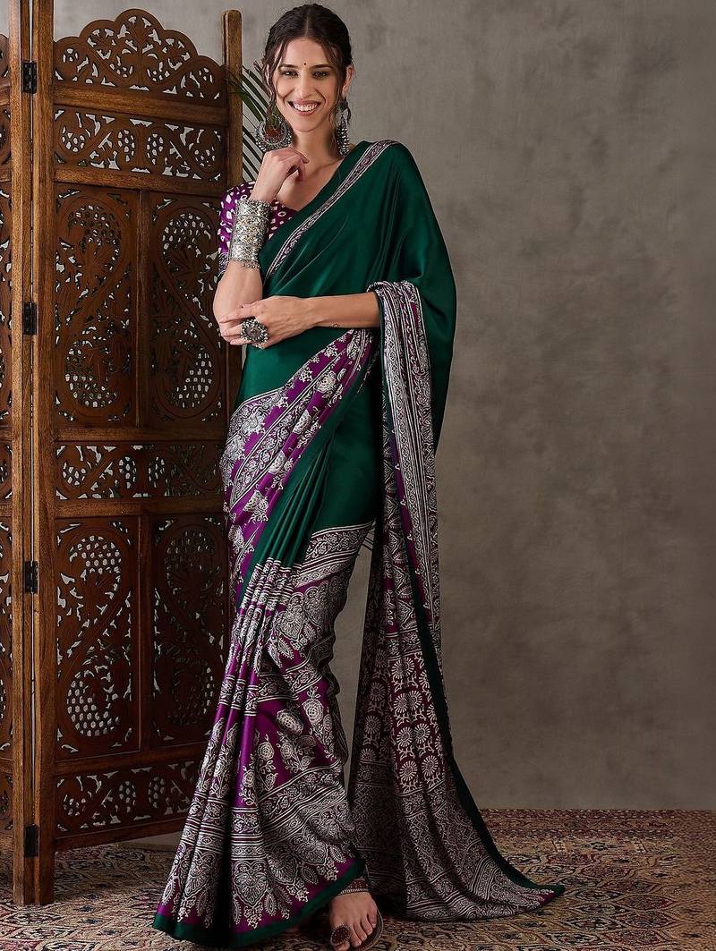 Green ethnic motifs silk blend saree