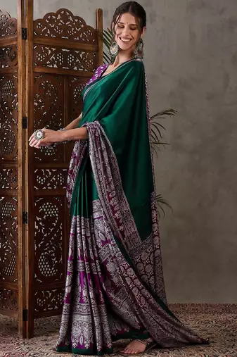 Green ethnic motifs silk blend saree