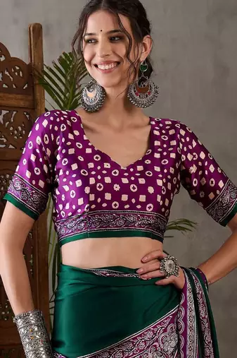 Green ethnic motifs silk blend saree