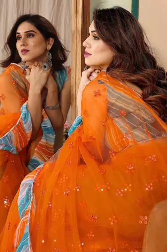 Orange embellished mirror work net designer saree