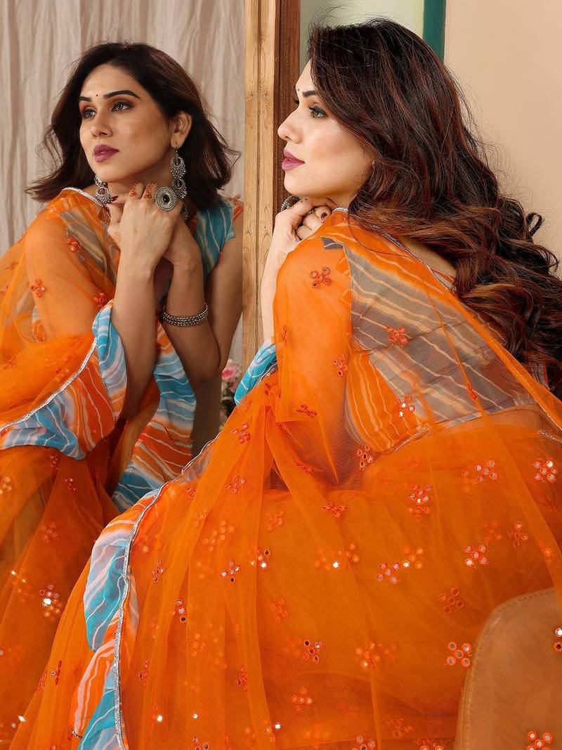Orange embellished mirror work net designer saree