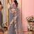 Grey embellished mirror work ruffle net saree