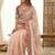Peach woven design embroidered silk blend fusion saree