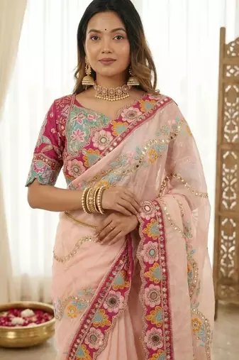 Peach woven design embroidered silk blend fusion saree