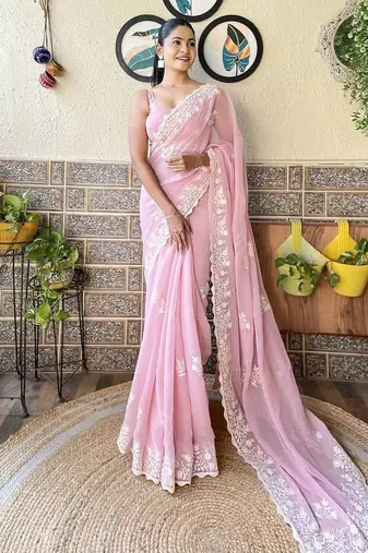 Pink embroidery work saree with unstitched blouse piece