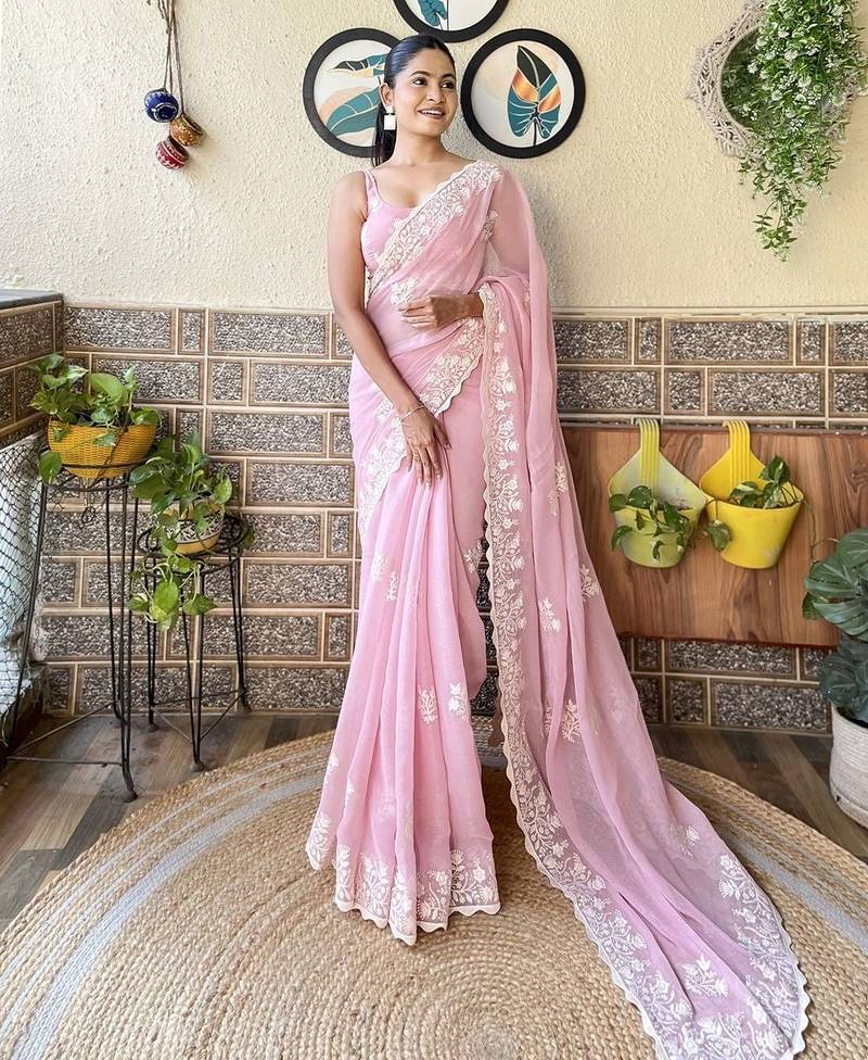 Pink embroidery work saree with unstitched blouse piece