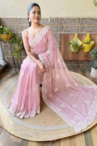 Pink embroidery work saree with unstitched blouse piece