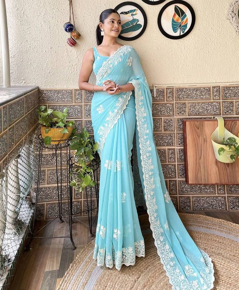 Blue embroidered saree with unstitched blouse piece