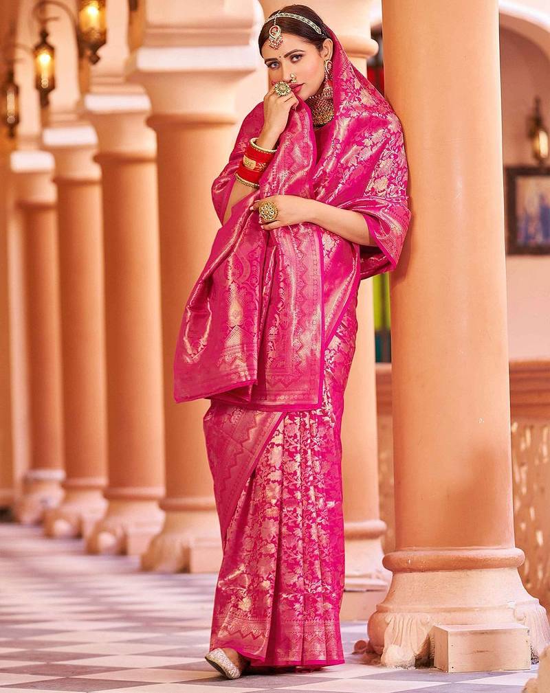 Pink ethnic motifs woven design zari saree