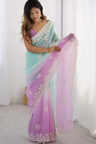 Teal embellished sequinned silk blend saree