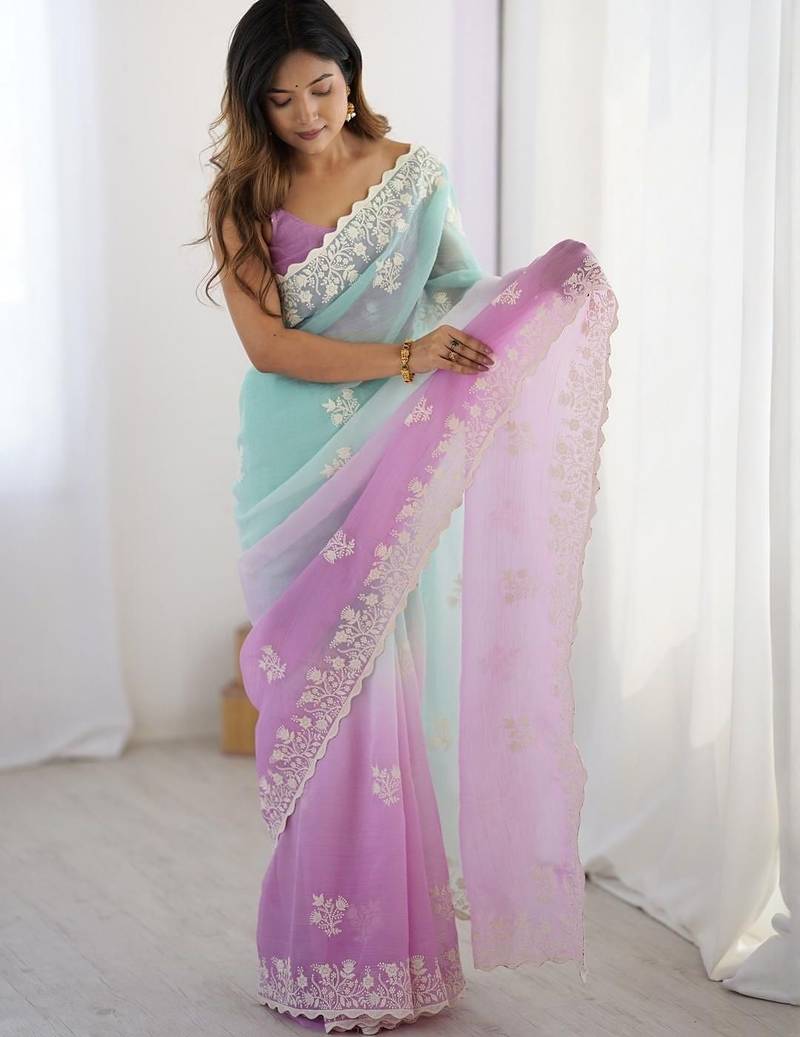 Teal embellished sequinned silk blend saree