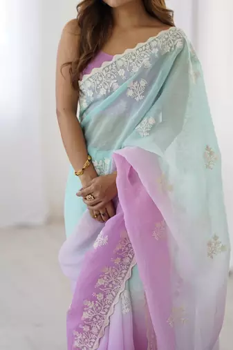 Teal embellished sequinned silk blend saree
