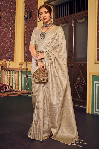 Cream ethnic woven design zari saree