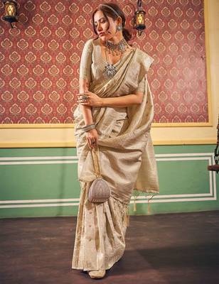Cream ethnic woven design zari saree 2