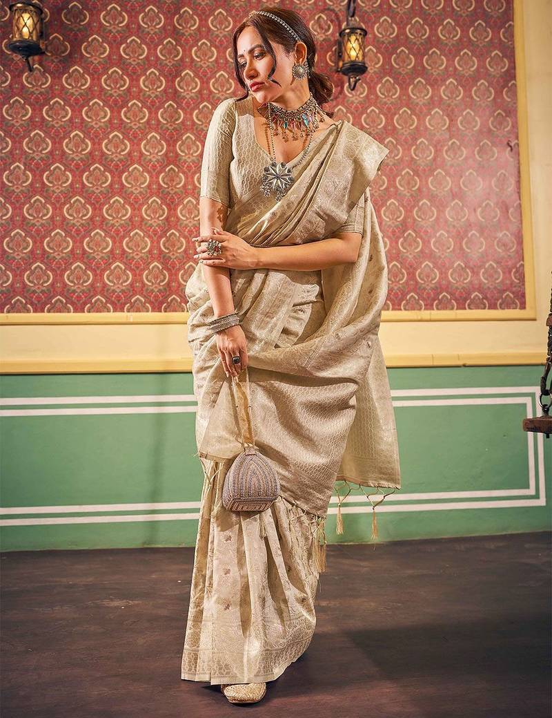 Cream ethnic woven design zari saree