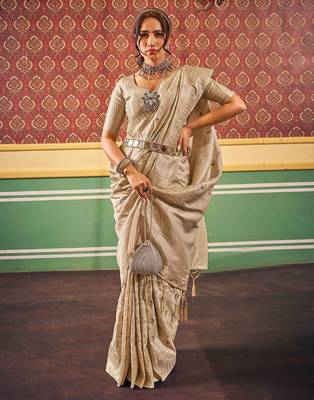 Cream ethnic woven design zari saree 3