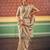 Cream ethnic woven design zari saree