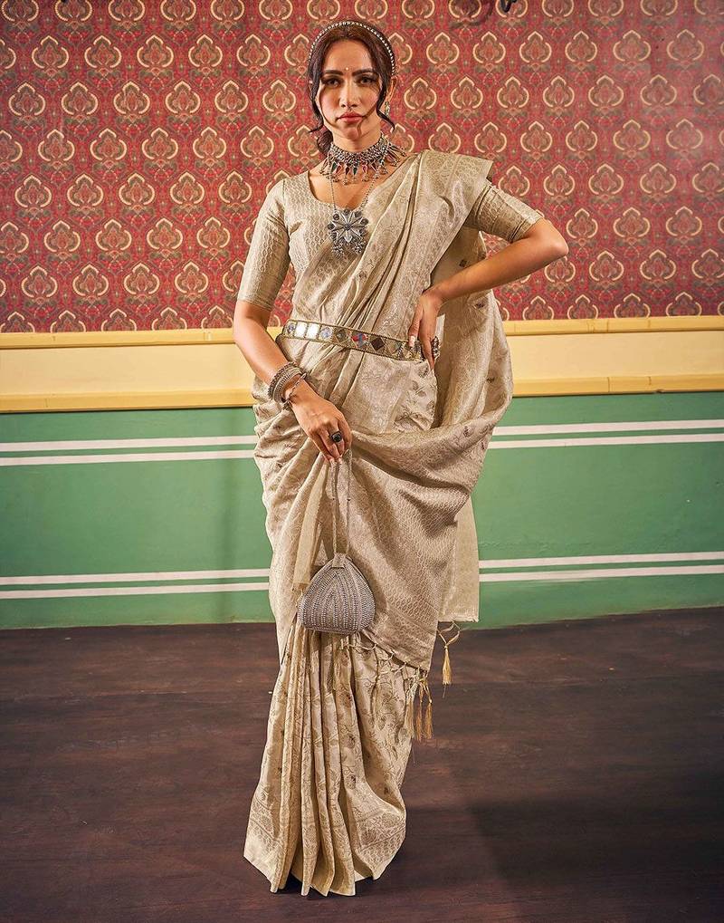 Cream ethnic woven design zari saree