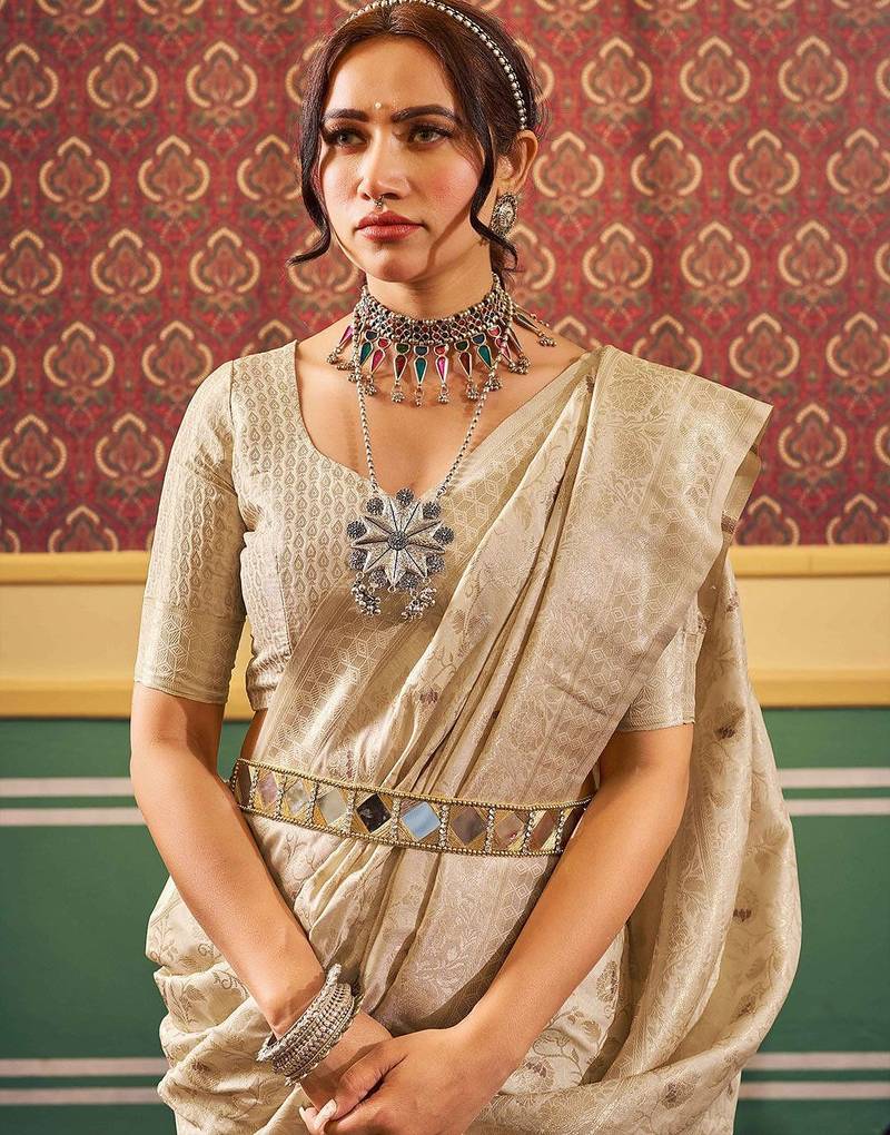 Cream ethnic woven design zari saree