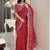 Red ethnic motifs embroidered silk blend saree