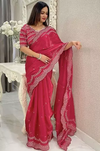Red ethnic motifs embroidered silk blend saree