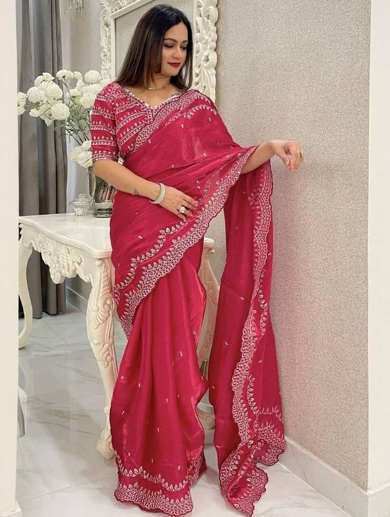 Red ethnic motifs embroidered silk blend saree