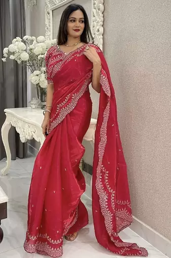 Red ethnic motifs embroidered silk blend saree