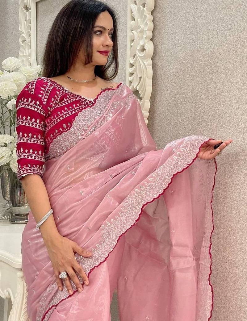 Pink ethnic motifs embroidered silk blend saree