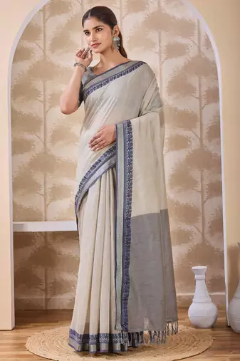 Ash grey zari and thread work border cotton blend saree with tassels with blouse