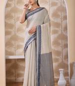 Ash grey zari and thread work border cotton blend saree with tassels with blouse