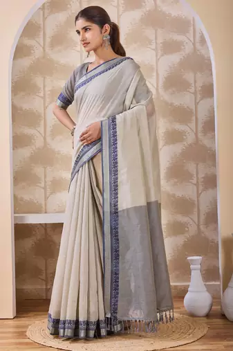 Ash grey zari and thread work border cotton blend saree with tassels with blouse