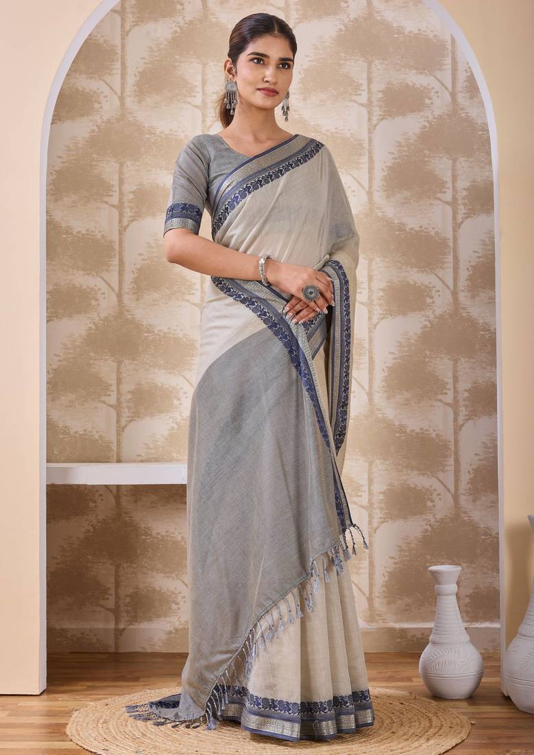 Ash grey zari and thread work border cotton blend saree with tassels with blouse