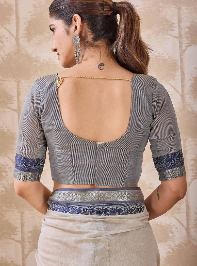 Ash grey zari and thread work border cotton blend saree with tassels with blouse