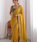 Yellow embellished embroidered pure georgette heavy work saree
