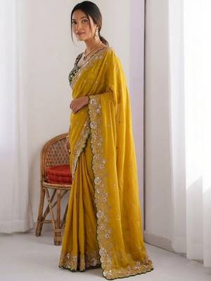 Yellow embellished embroidered pure georgette heavy work saree 2