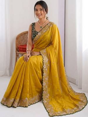 Yellow embellished embroidered pure georgette heavy work saree 4