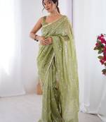 Green women ethnic motifs embroidered beads and stones embellished saree