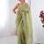 Green women ethnic motifs embroidered beads and stones embellished saree