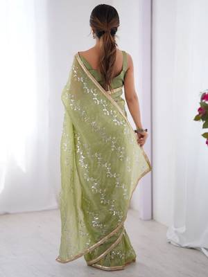Green women ethnic motifs embroidered beads and stones embellished saree 2