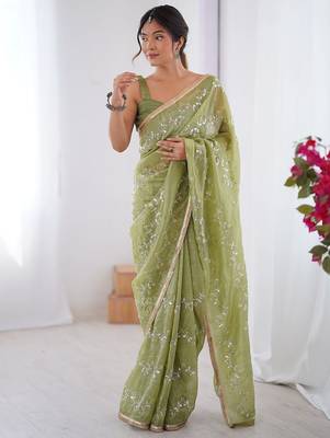 Green women ethnic motifs embroidered beads and stones embellished saree 3