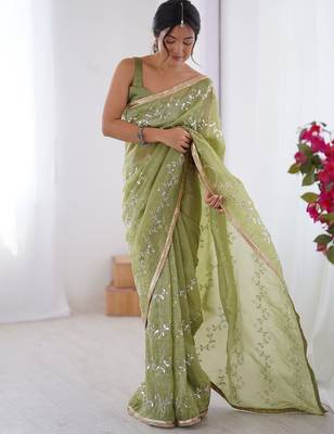 Green women ethnic motifs embroidered beads and stones embellished saree 4