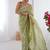 Green women ethnic motifs embroidered beads and stones embellished saree