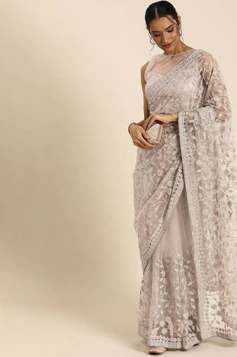 Beige floral embroidered beads and stones embellished net saree
