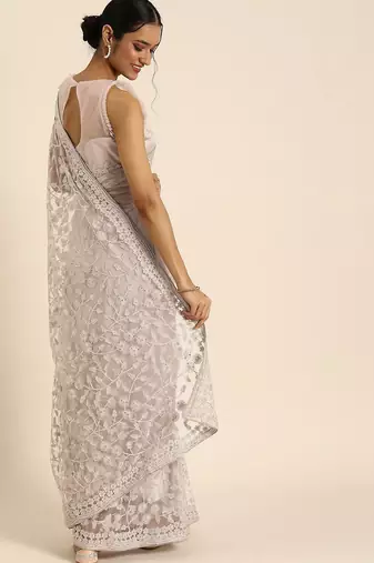 Beige floral embroidered beads and stones embellished net saree