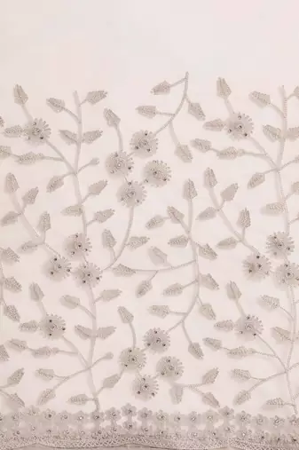 Beige floral embroidered beads and stones embellished net saree